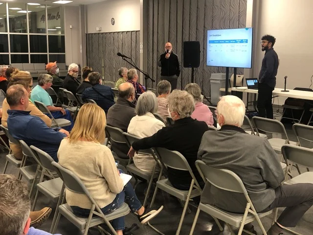 The developers respond to several questions from those on hand at the open house. (Jim Dumville photo)