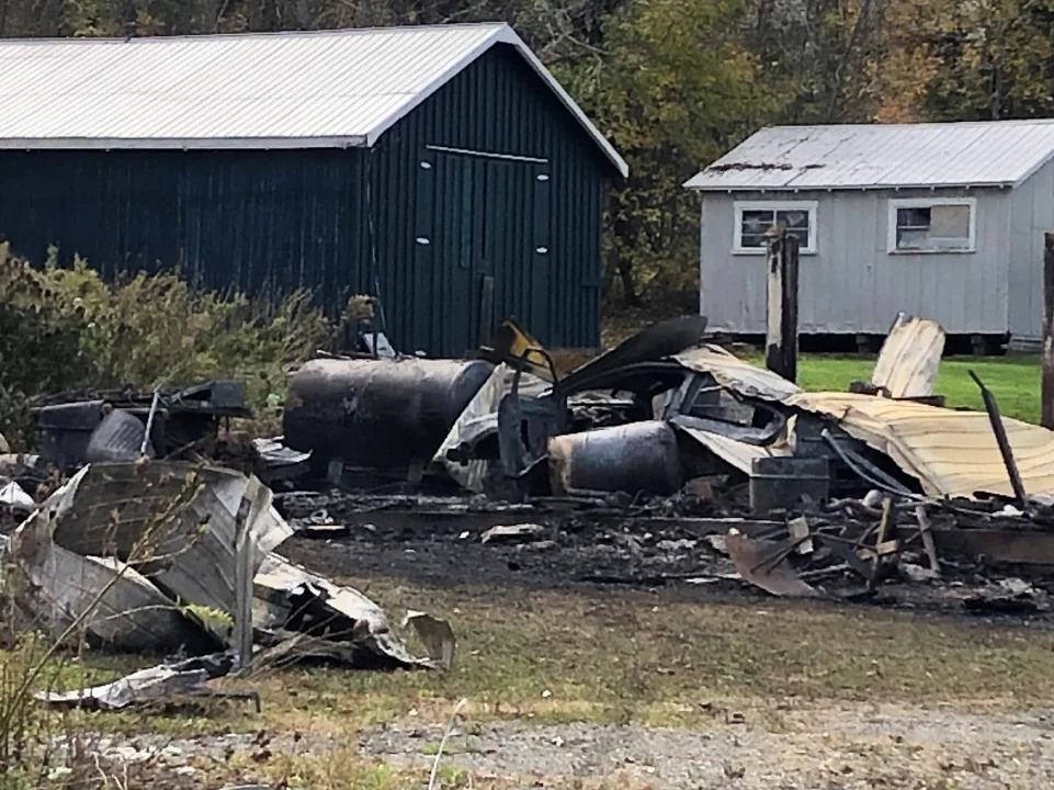 The N.B. Fire Marshal’s Office is investigating an early-morning fire that destroyed a structure on the Old Houlton Road. (Jim Dumville photo)
