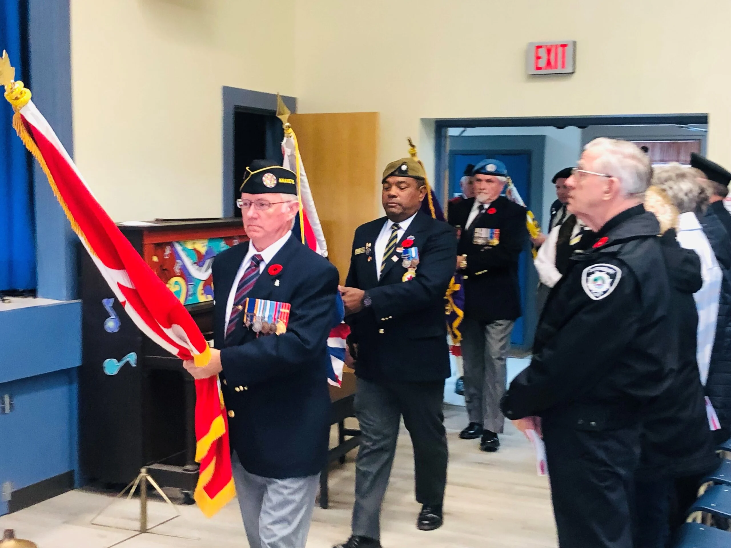 Legion and AVAVETs form the colour party to open the Remembrance ceremonies. (Jim Dumville photo)