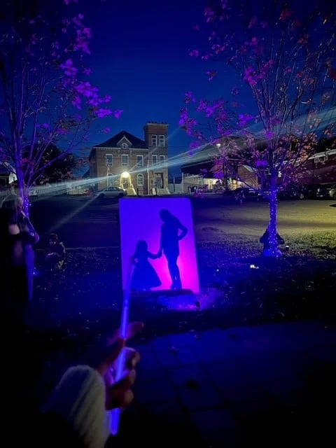 Purple silhouettes send an important message at Purple Lights Night, which kicked Family Violence Prevention Month on Nov. 1 at Citizen Square Park in Woodstock. (Submitted photo)(Jim Dumville photo)