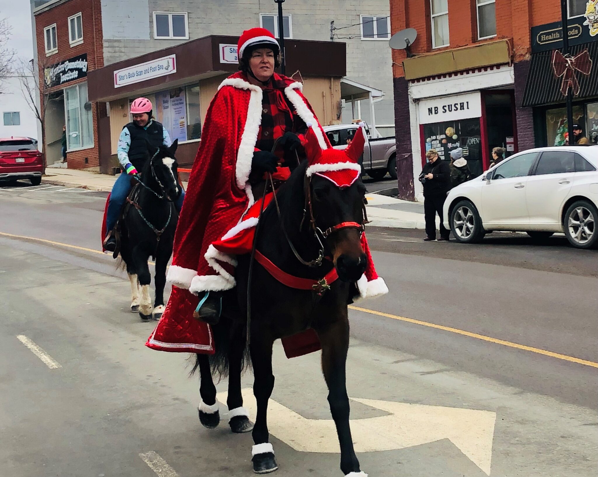 Scenes from Woodstock’s Santa Claus Parade River Valley Sun