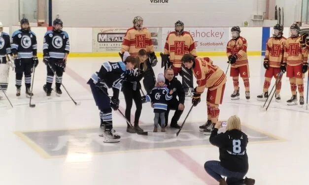 Memorial hockey game remembers special player, coach