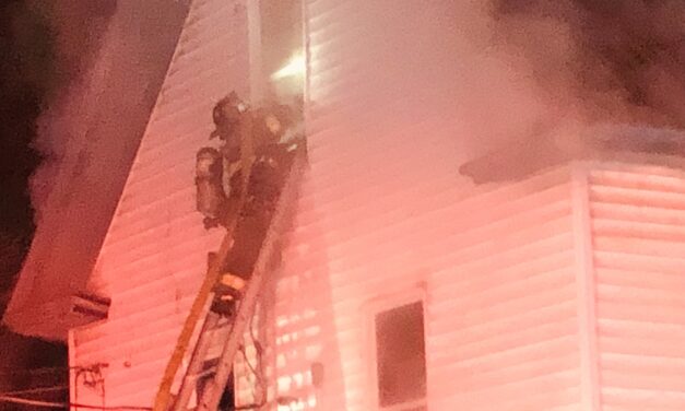 Firefighters battle house fire in frigid temperatures