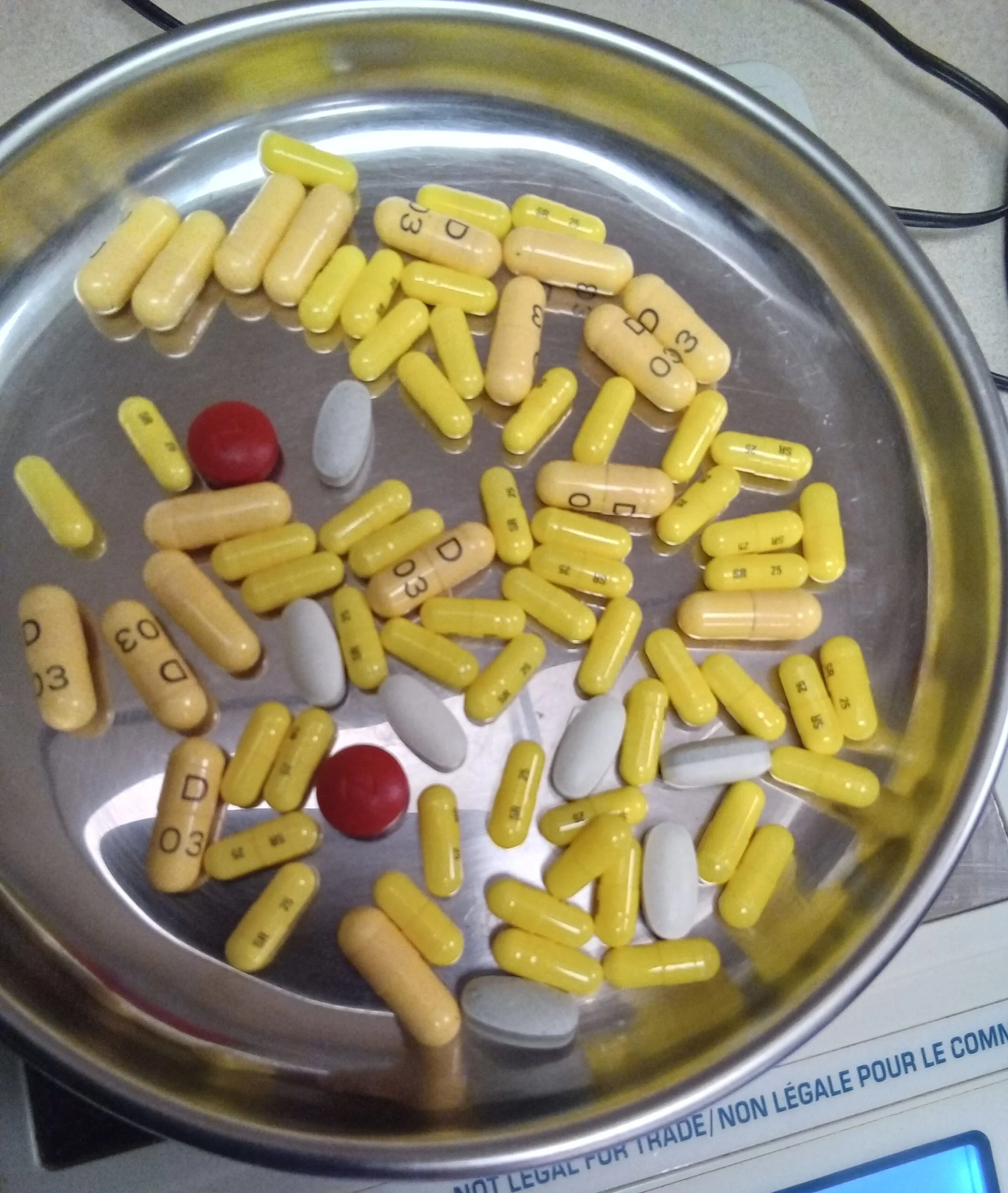 The Woodstock Police Force seized a quantity of pills during its investigation and searches following the arrest of two individuals in downtown Woodstock. (WPF photo)
