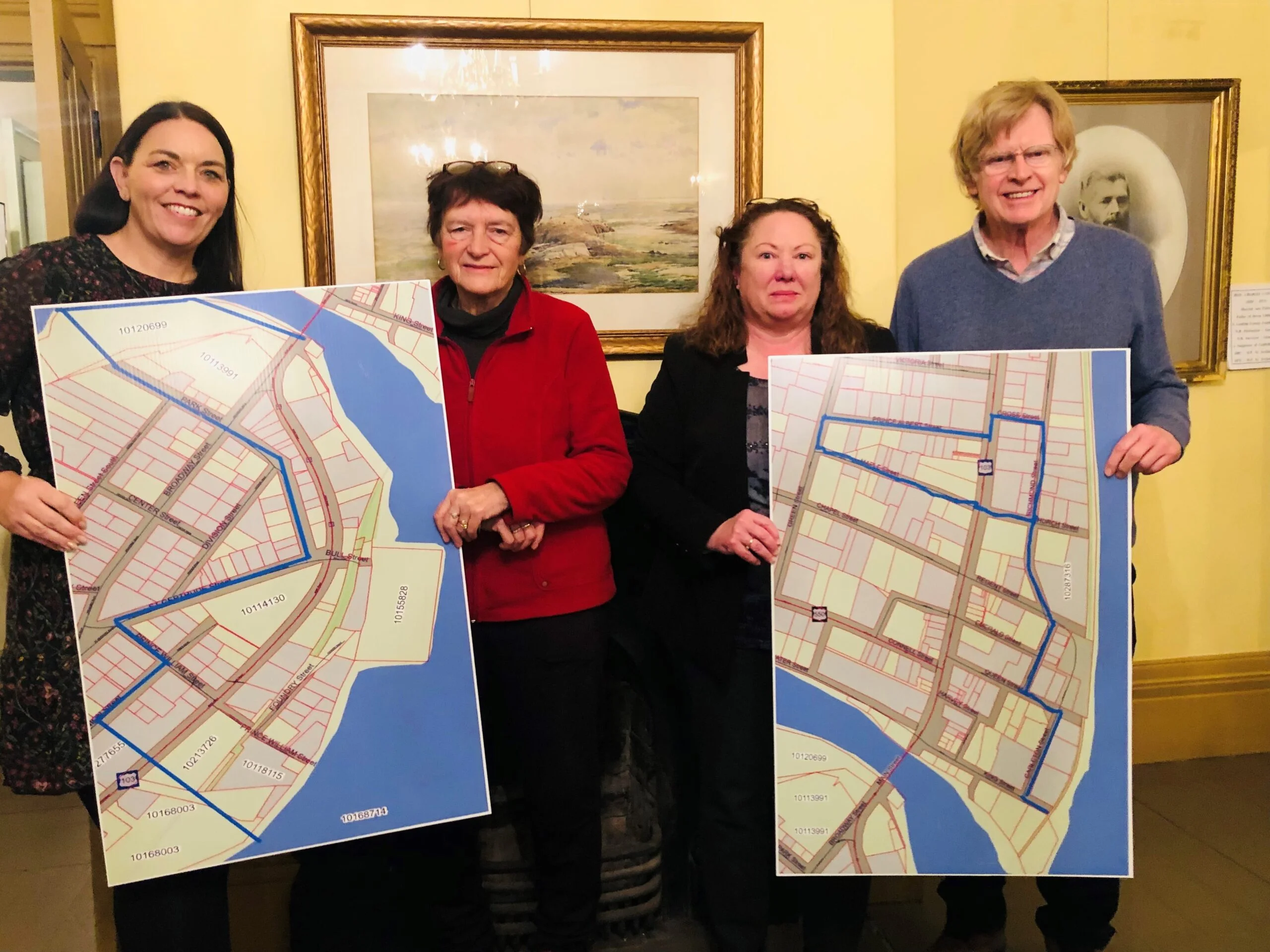 Members of the Woodstock Business Improvement Corporation (Downtown Woodstock), from left, Coun. Julie Calhoun-Williams, Vice President Anna Andow, advisor Trina MacDonald and President John Thompson, attended an open house at Connell House on Jan. 20. (Jim Dumville photo)