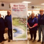 Curlers deliver thousands to cancer support group