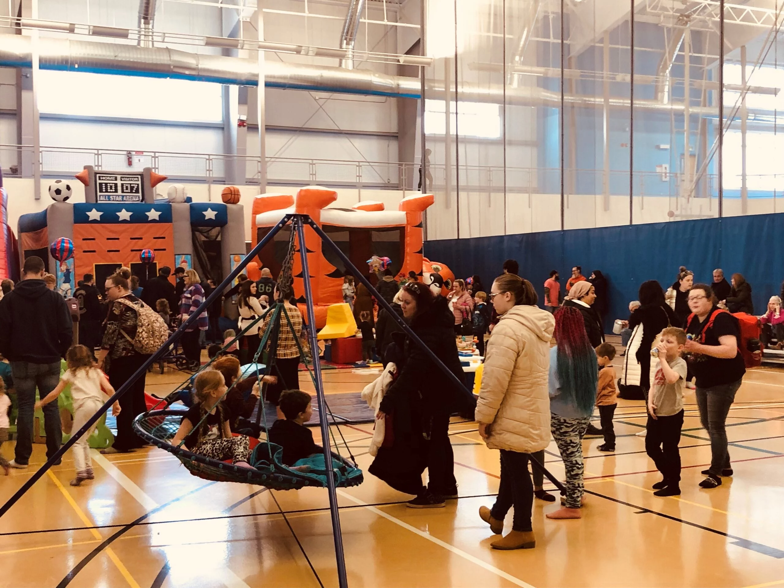 Families enjoy activities and games at the Planet Youth carnival at the AYR Motor Centre on Family Day. (Jim Dumville photo)