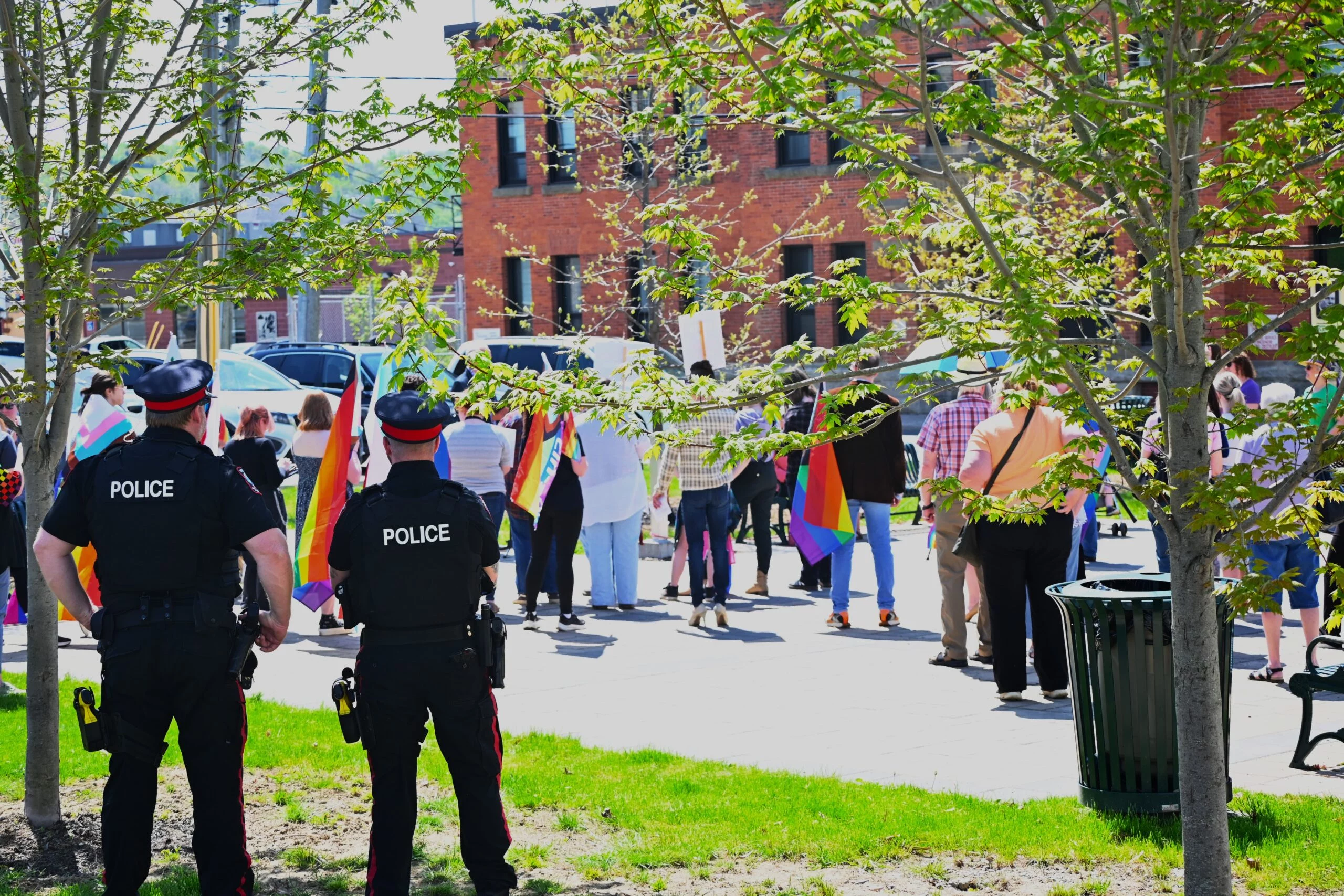People gathered at Citizen’s Square Park in Woodstock on Friday, May 17 to listen to speakers on the International Day Against Homophobia, Transphobia, and Biphobia. (Jim Dumville photo)