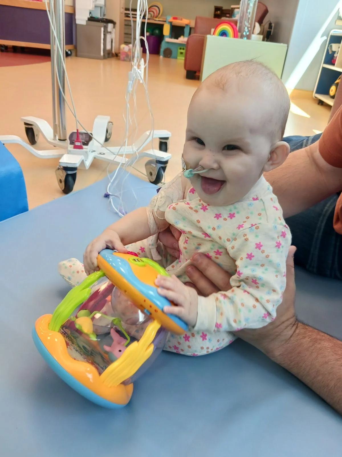 Jade Rhymer may be sick, but is still a joyful child who loves to play with her toys. (Submitted photo)
