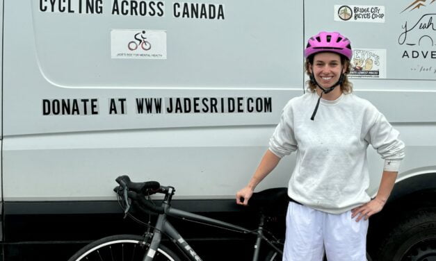 A ‘driven’ young woman cycles coast-to-coast for mental health