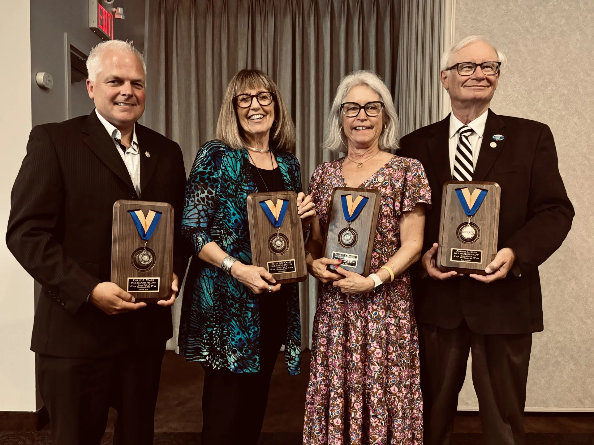 Woodstock Rotary Club recognized four individuals with the Paul Harris Fellowship Awards on June 24. From left are Corey Clark, Betty Lou Craig, Susan Hayden, accepting on behalf of her late husband Brian Hayden, and Arthur Slipp. (Jim Dumville photo)