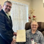 Woodstock man honoured for contributions to country, community