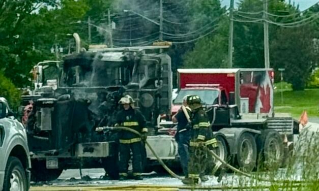 Transport truck on fire disrupts traffic in Woodstock