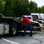 Car and dump truck collide during morning commute in Woodstock