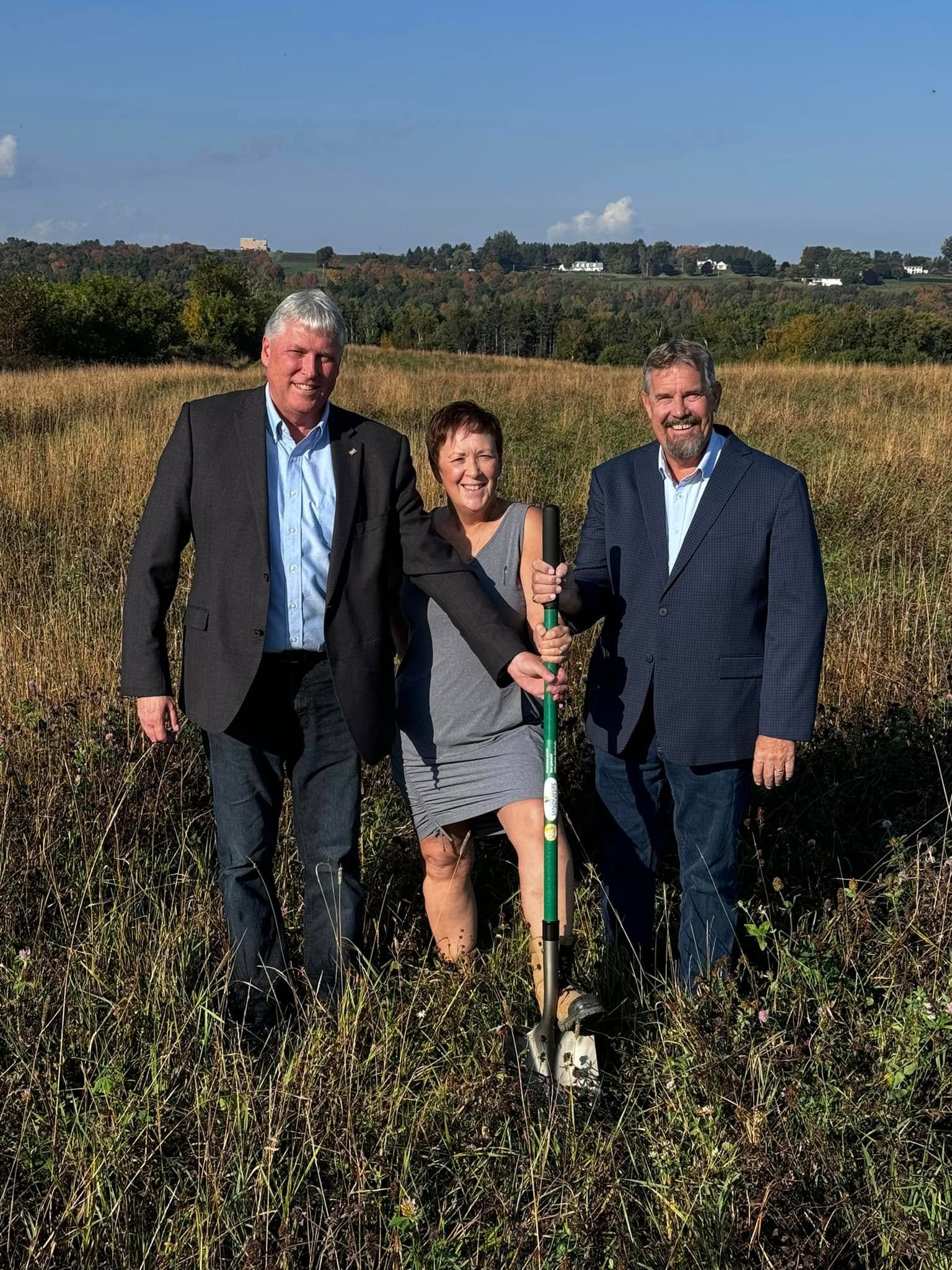 Just before the 2024 provincial election, MLAs (from left) Richard Ames ( Carleton-York), Margaret Johnson (Carleton-Victoria), and Bill Hogan (Woodstock-Hartland) held a photo op at the ‘preferred site’ of the new school to be built in Florenceville-Bristol. (Facebook photo)