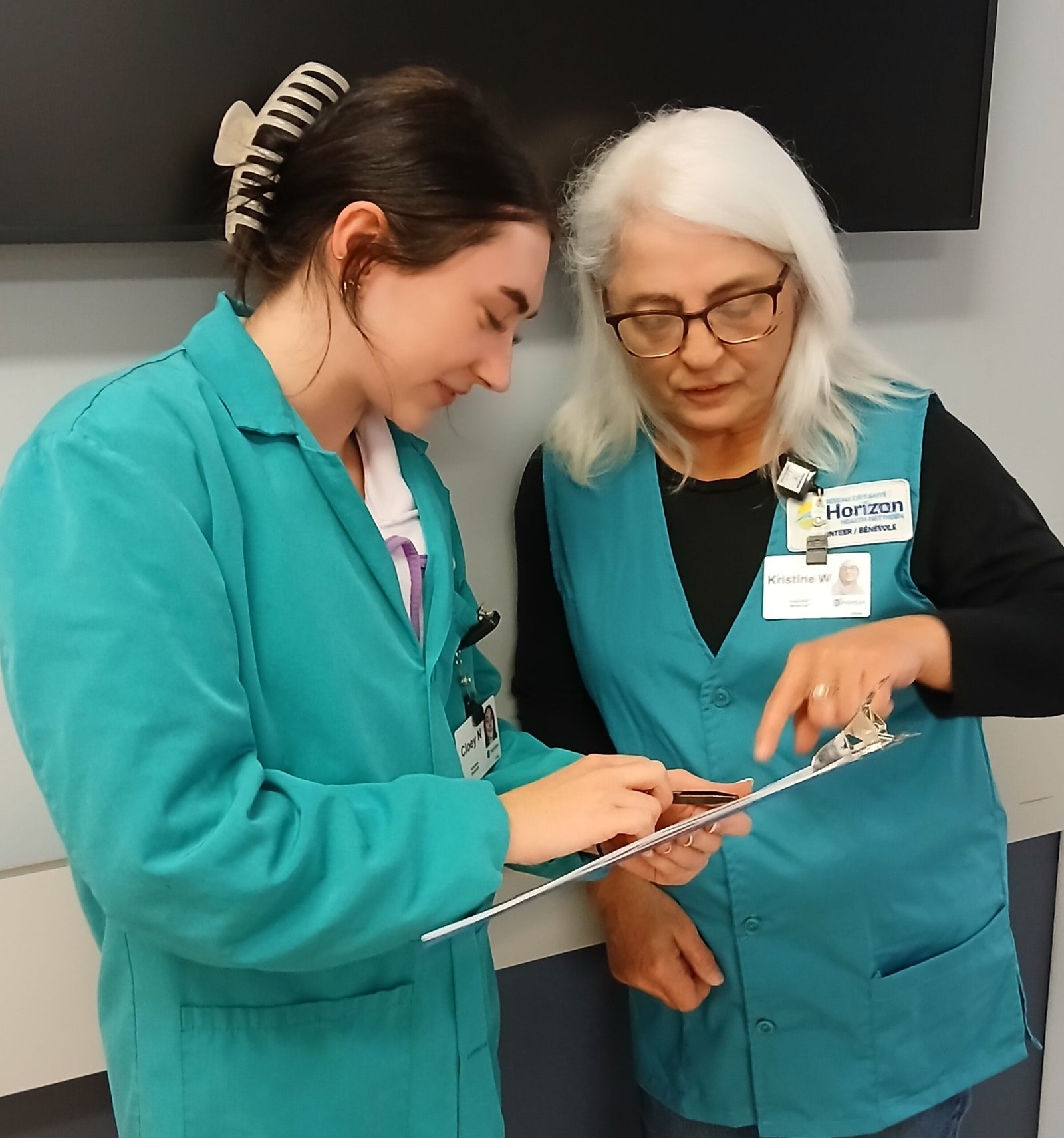 From left, Cloey Nason and another Meal Mates volunteer, Kristine Williams, working at the Upper River Valley Hospital. (Shelly Hubbert photo)
