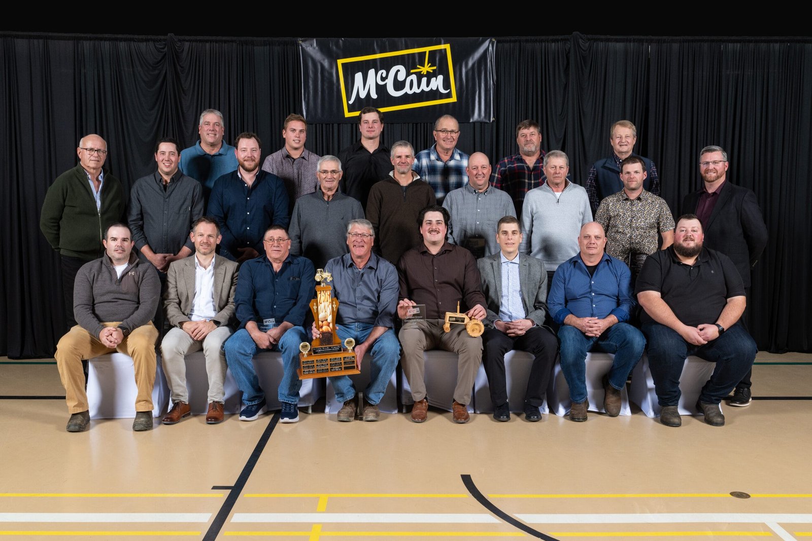 Farm representatives from the Florenceville recipients of the 2025 McCain Grower awards (L to R): Eugene Antworth, Greyson Antworth, Reid Culberson, Ethan Antworth, Dusty Culberson, Brandon Culberson, Carl Crandlemire, Robert Oakes, Keith Linton, Randy McLean, Jason McLean, Shawn Paget, Roy Culberson, Robert Culberson, Peter Kingston, Ryan Hemphill, Dan Metheringham, Rodney Greene, Darrell Greene, Graeham Greene, Alex Rideout, Travis Pirie, Jeremy Kilfoil. (Photo courtesy of McCain Foods)