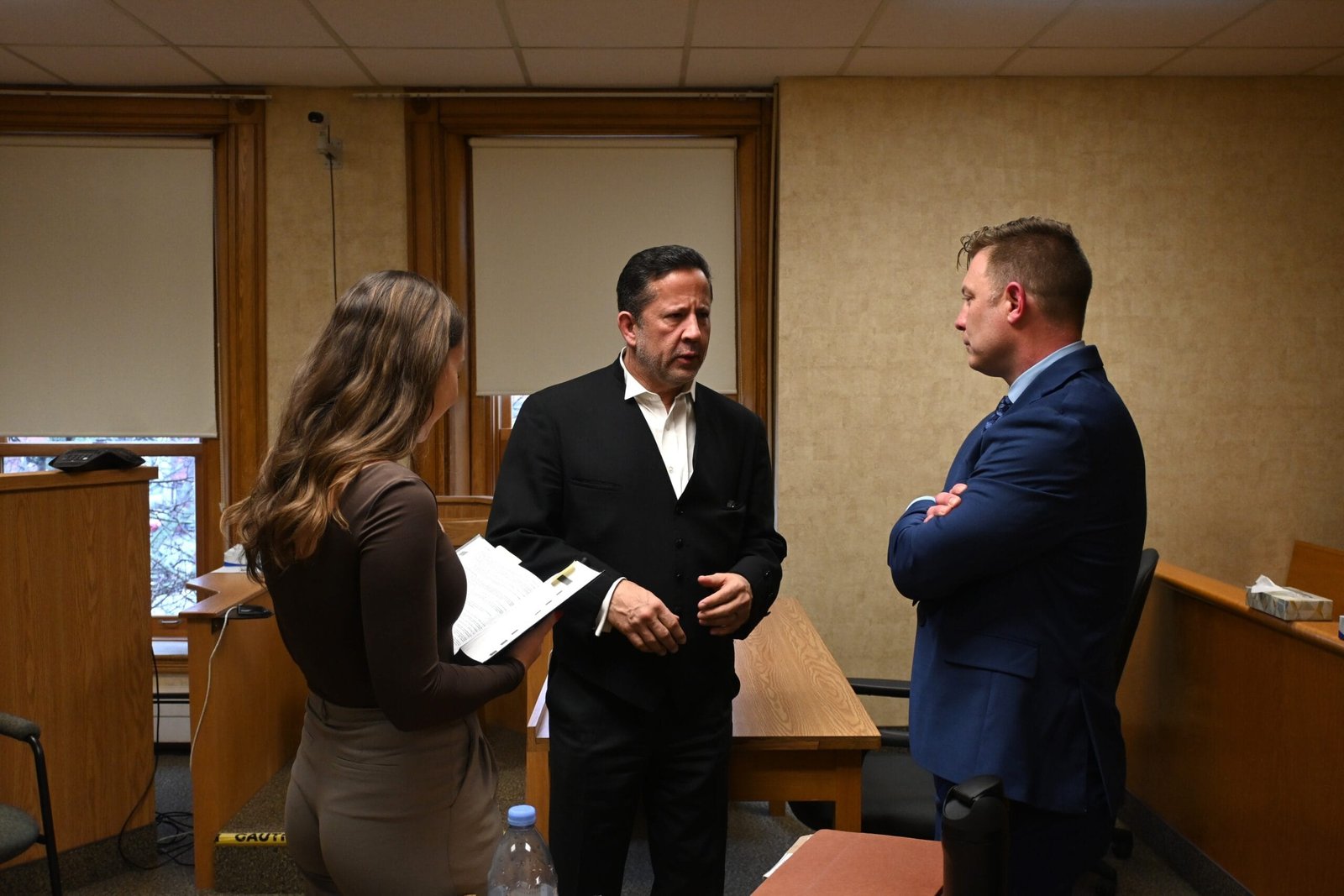 Cpl. Andrew Whiteway (right) consults with his defence counsel, lawyer T.J. Burke (centre), and articling clerk Taylor Davis after his Whiteway’s trial concluded on Thursday. (Theresa Blackburn photo)
