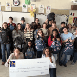 Classroom kindness: students fill backpacks to support the homeless