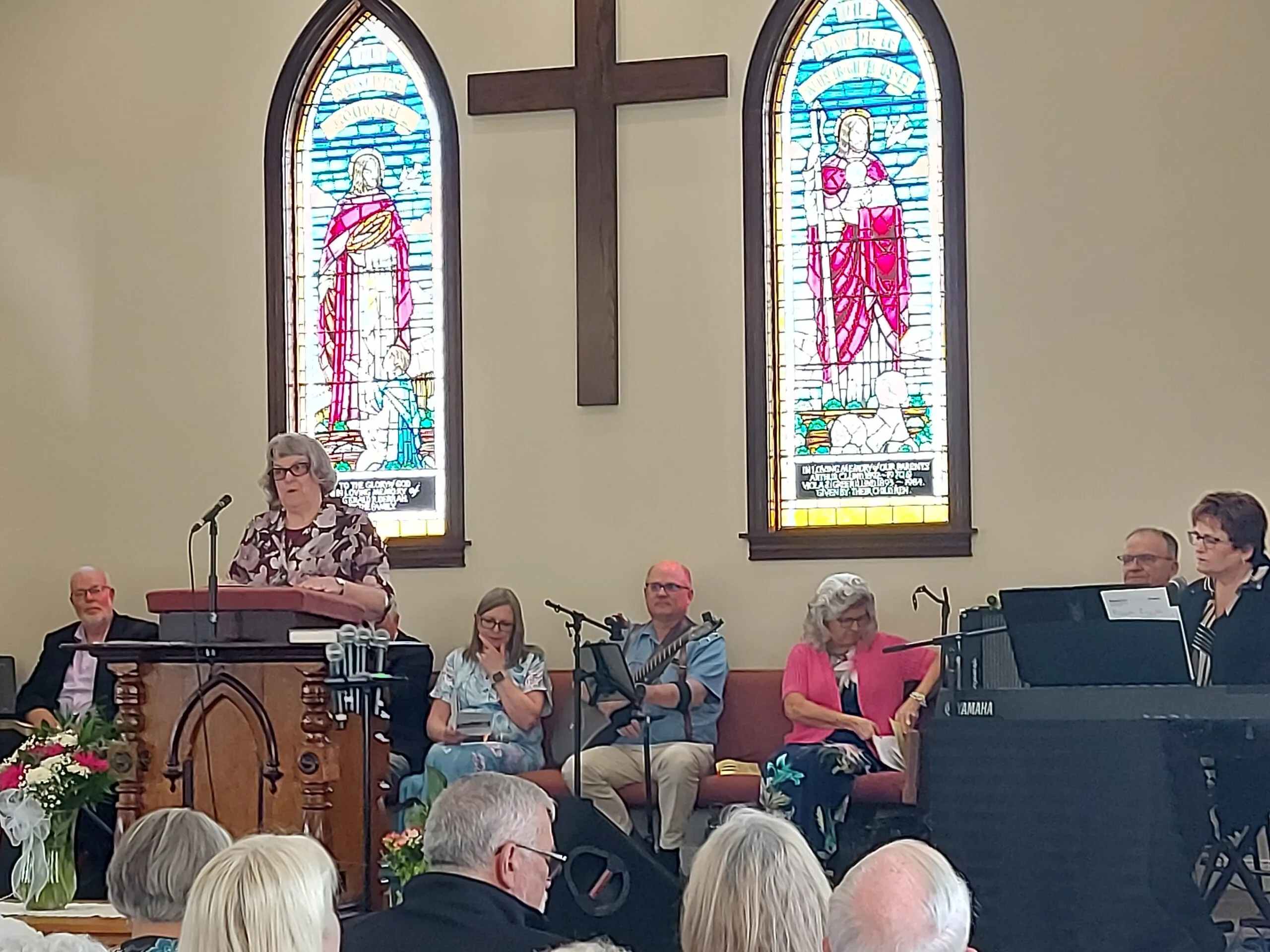 Barb Shaw addresses the Mount Pleasant congregation during the opening of the new church. (James Ness photo)