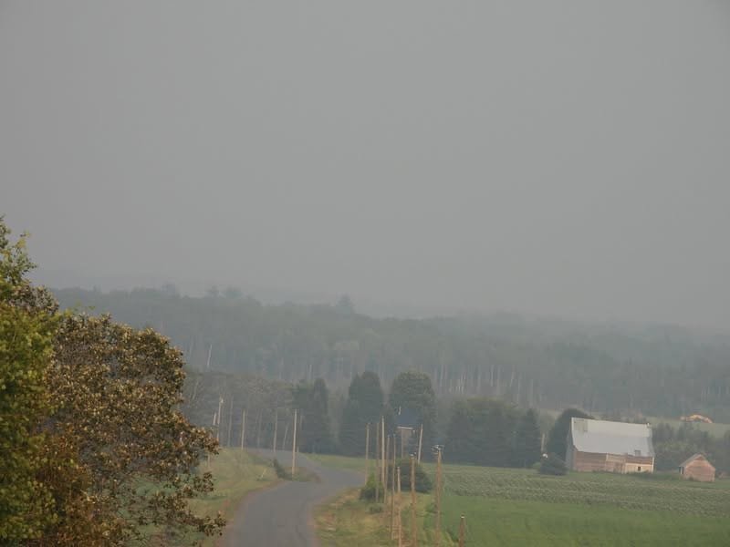 Smoke is reducing visibility and causing air quality issues in many communities across western New Brunswick, including Watson Settlement. (Tammey McLean photo)