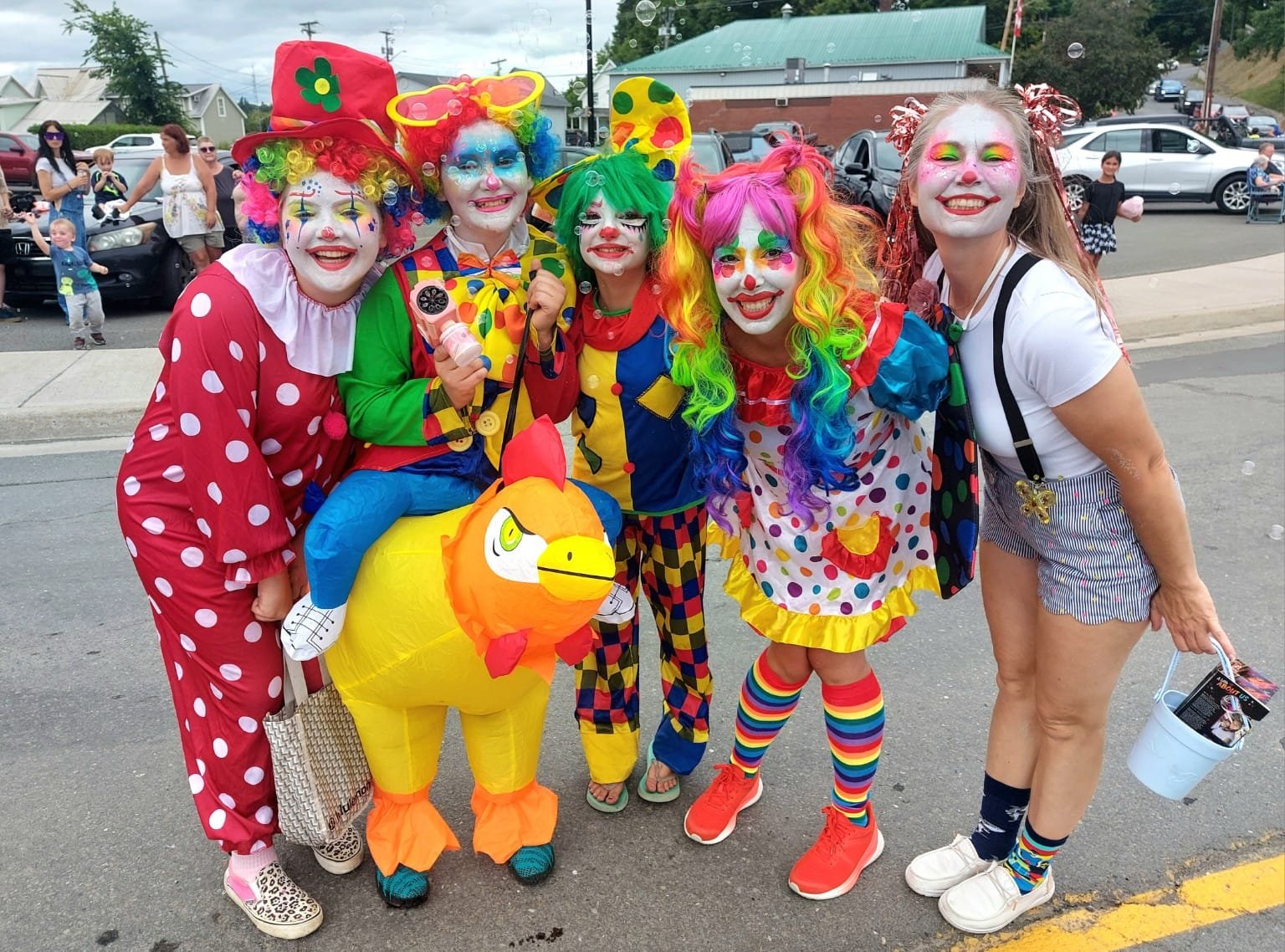 Bring on the clowns: Saturday’s parade included (left to right) Cailyn Bradley, Violet Oudot, Lily Oudot, Mandy Oudot, and Terra Culberson. (James Ness photo)