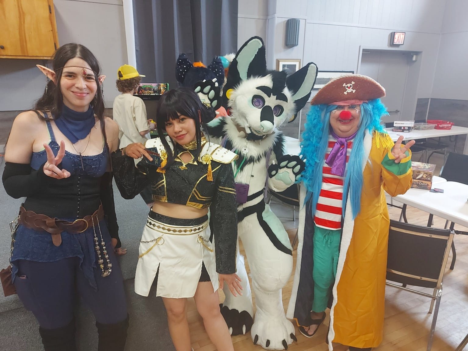 From left, Woodstock Cosplay organizer Harmony Fine poses with Tsujhen, Inkwell, and Never too Old to Cosplay. (James Ness photo)
